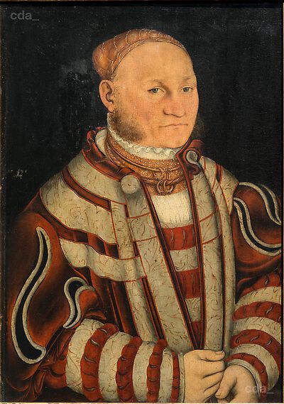 Portrait of a man with red whiskers